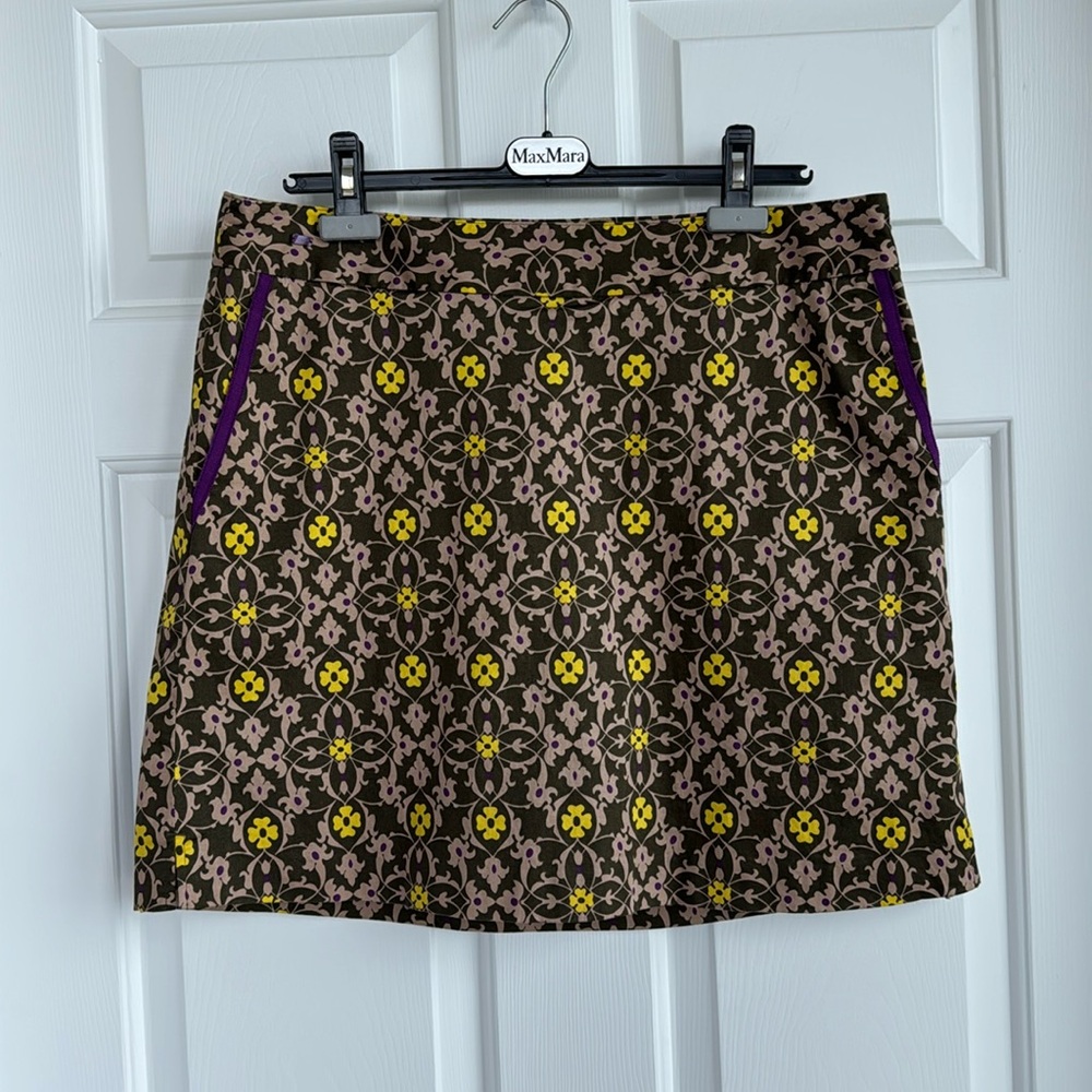 Lizgolf yellow, brown, purple, and mauve golf skort.